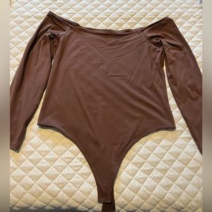 Nuuds XL off the shoulder bodysuit in the color chocolate